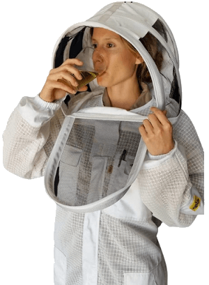 woman wearing bee suit and unzipping her veil to drink water