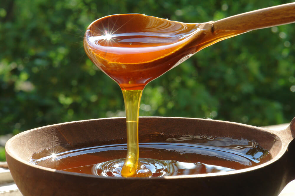 honey drizzled into bowl