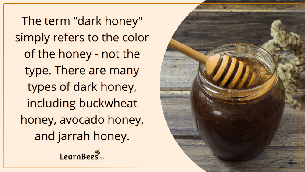 Dark honey in jar with honey dipper